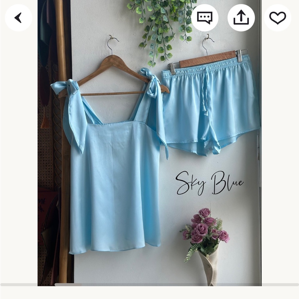 Sky blue satin pajamas top and shorts worn once no damages or stains